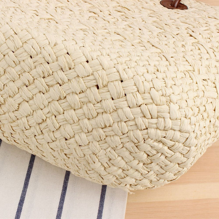 Beach bag made of high-quality braided straw with stylish leather handles Kalsten