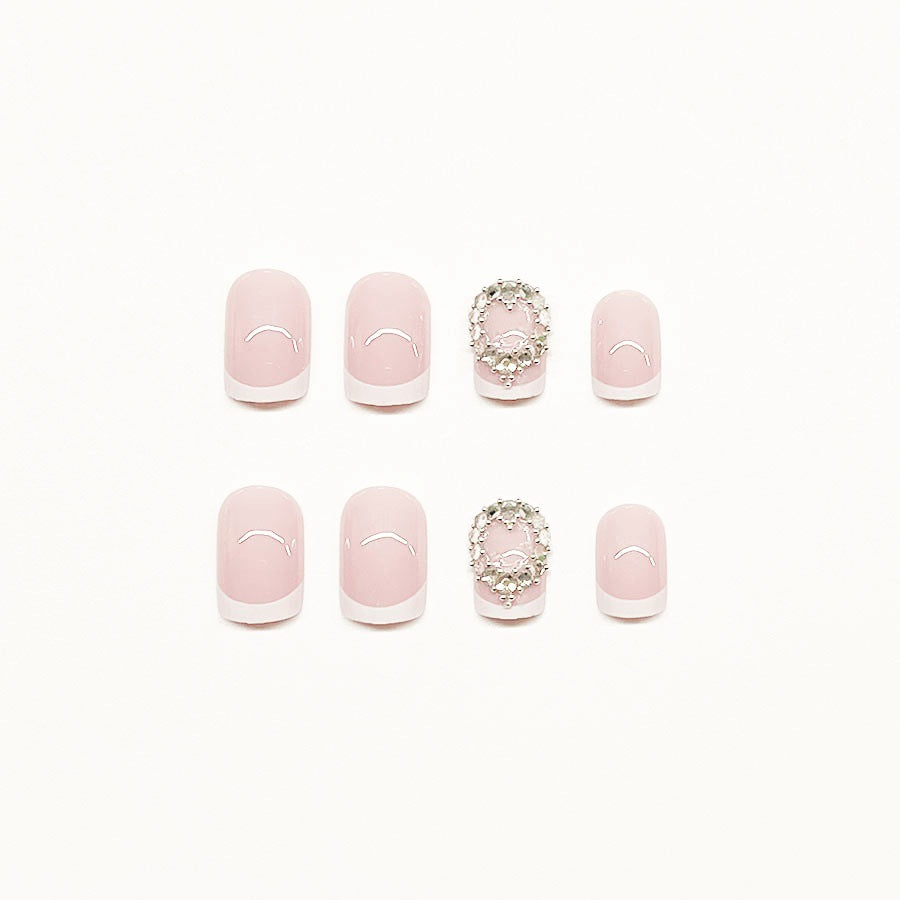 Artificial nail set with elegant French design and rhinestone embellishments Kalsten