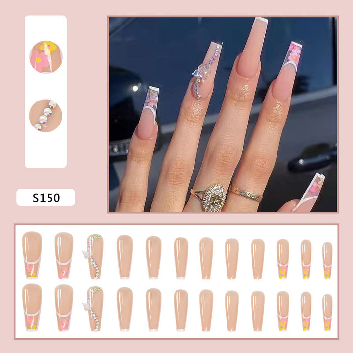 Artificail nail tips in elegant French design with floral accent Kalsten