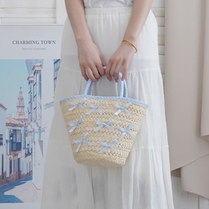 Basket bag with delicate bows and padded edge Kalsten