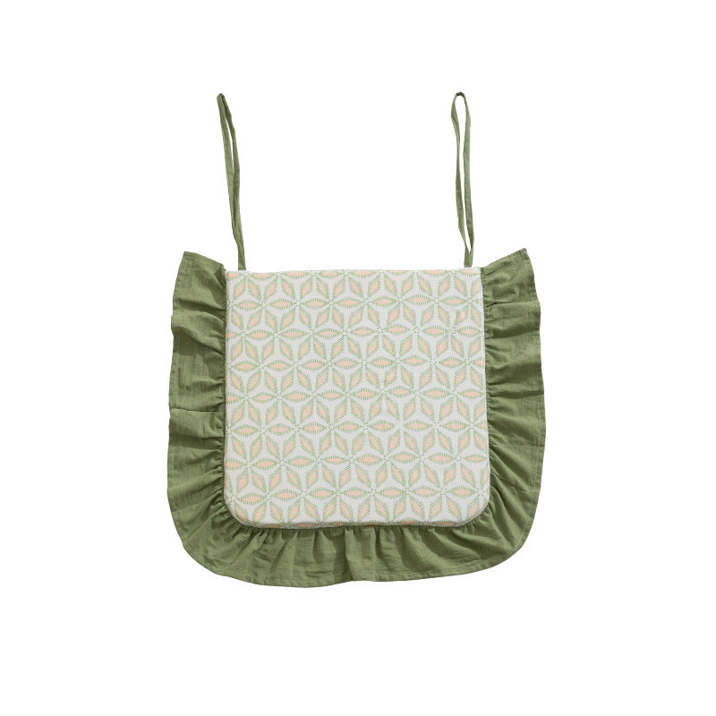 Padded chair cushion with ties, ruffled edge and embroidered hole pattern look Kalsten
