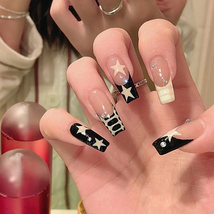 Artistic Nail Extensions with Star and Animal Design Kalsten