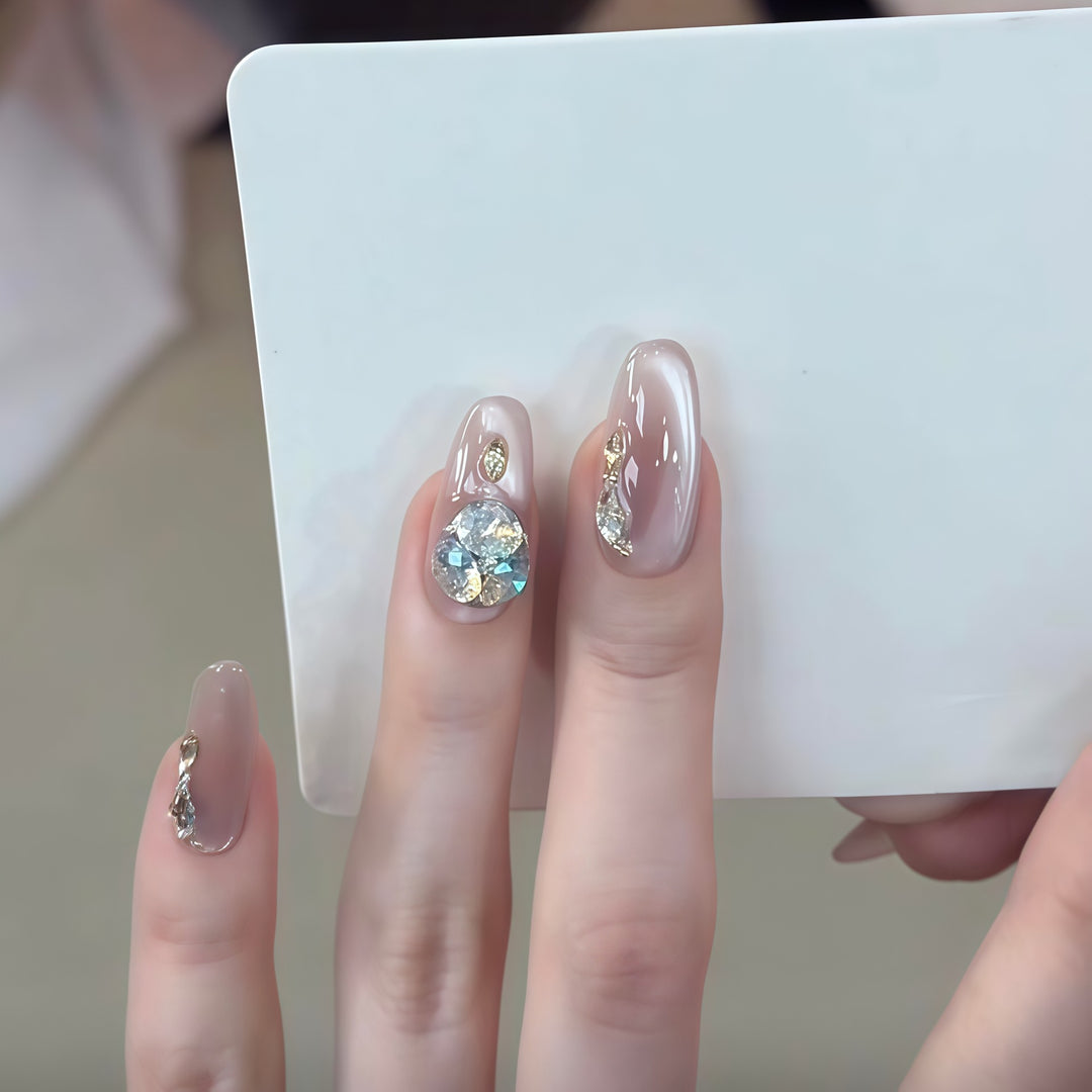 Glamorous artificial nails with rhinestone embellishments Kalsten