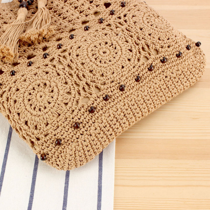 Hand-knotted macrame bag with playful pendant Kalsten