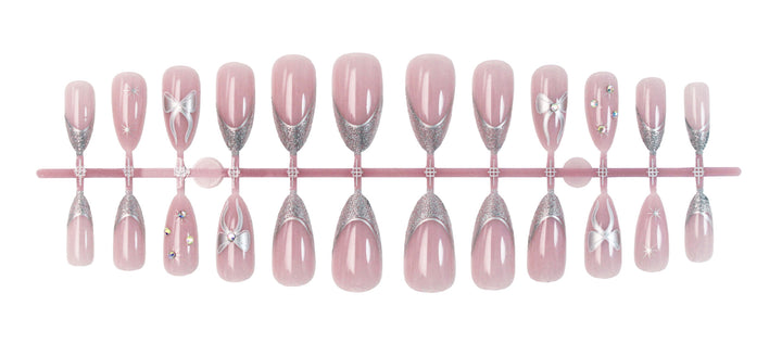 Artificial nail set with glamorous glitter and flower accents Kalsten