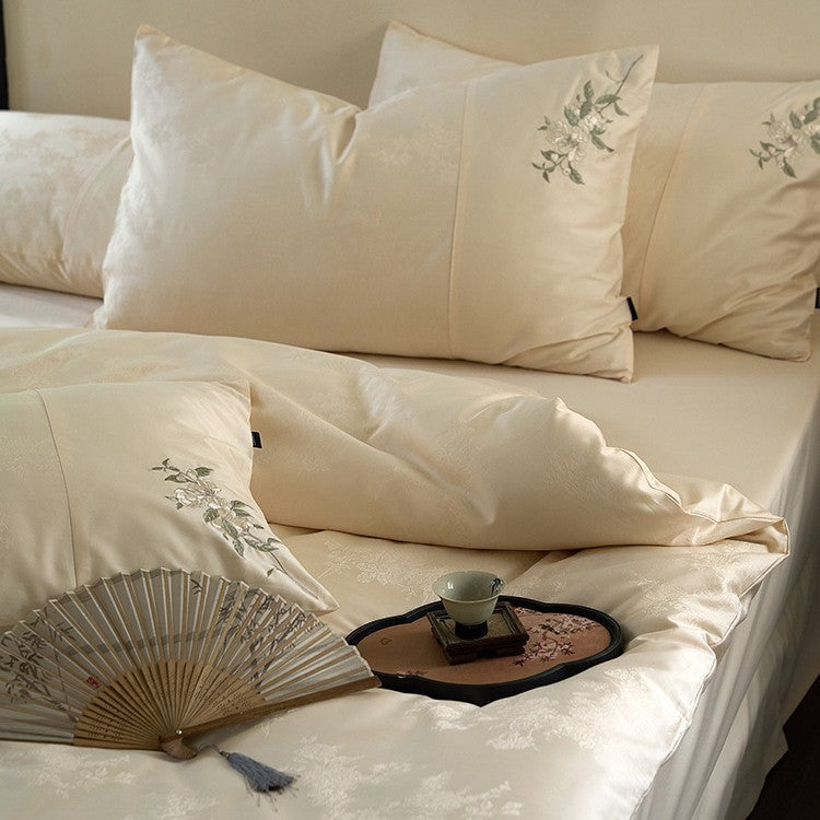 Luxurious satin bedding set with delicate floral embroidery