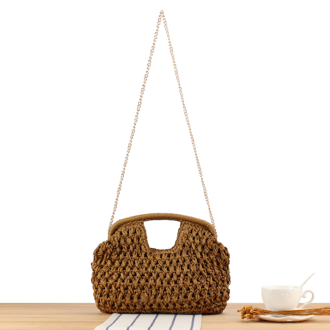 Handbag made of naturally untreated woven material with elegant chain embellishment Kalsten