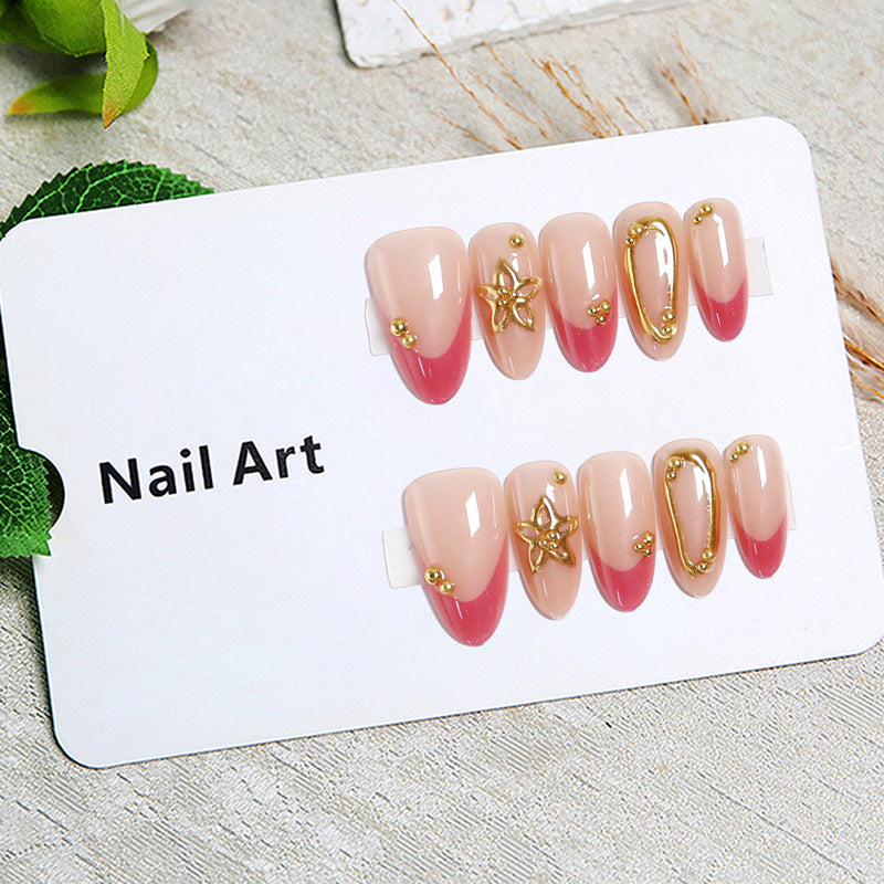 Artful nail tips with delicate gold accents Kalsten