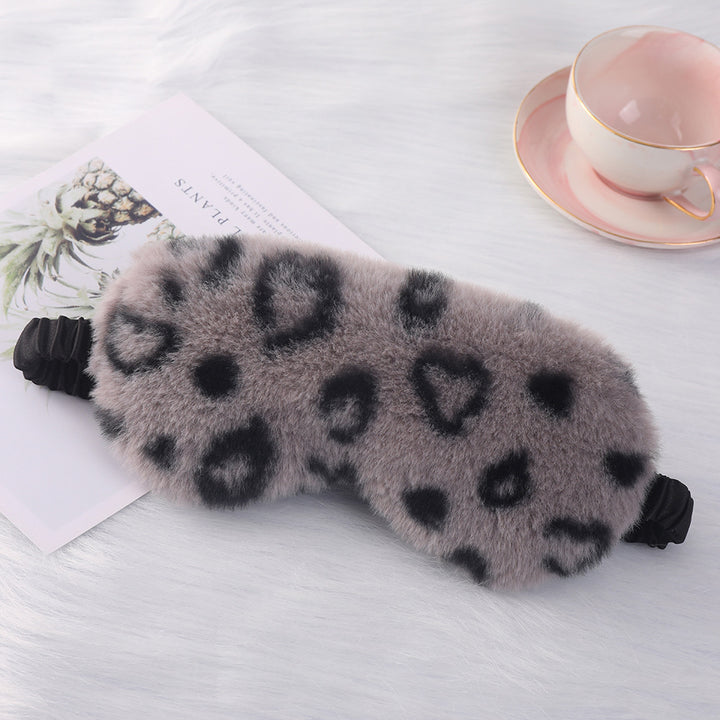 Women's cuddly faux fur sleep mask with heart-embossed surface and gathered comfort band Kalsten