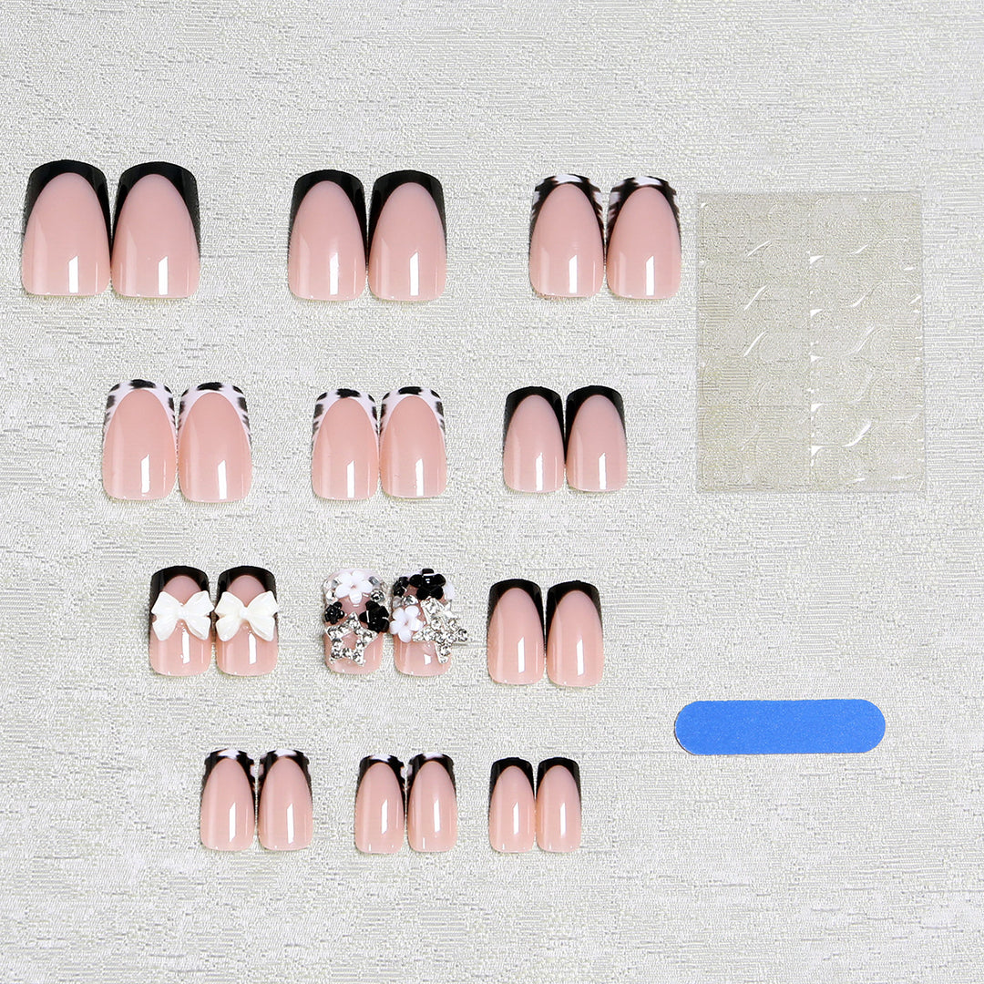 Artificial nail design with elaborate 3D decorations Kalsten