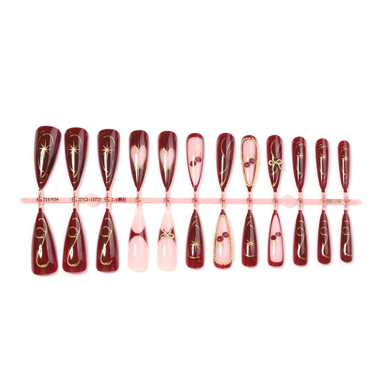 Artificial nail set with luxurious golden accents and glamorous design Kalsten