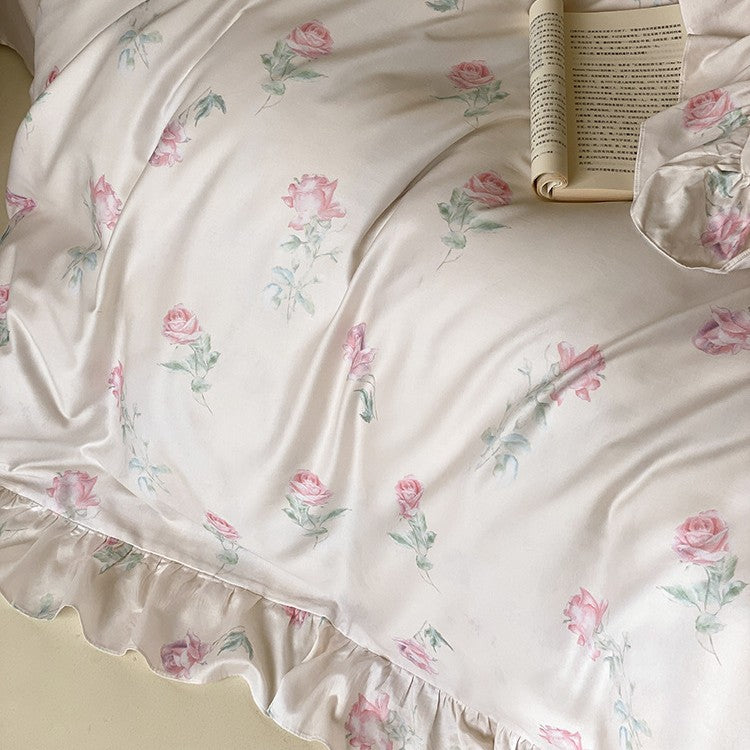 Luxurious satin bedding set with delicate rose pattern and ruffled hem