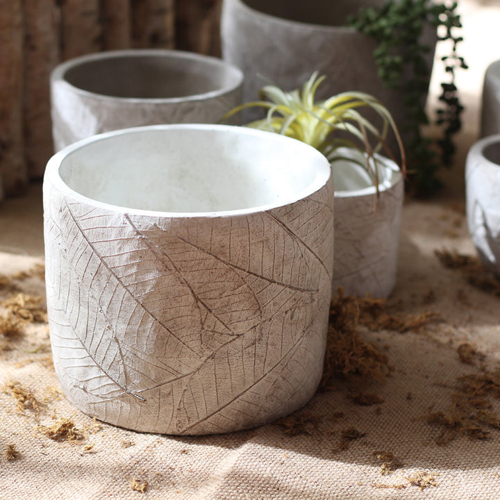 Decorative plant container made of handmade ceramic with leaf pattern Kalsten