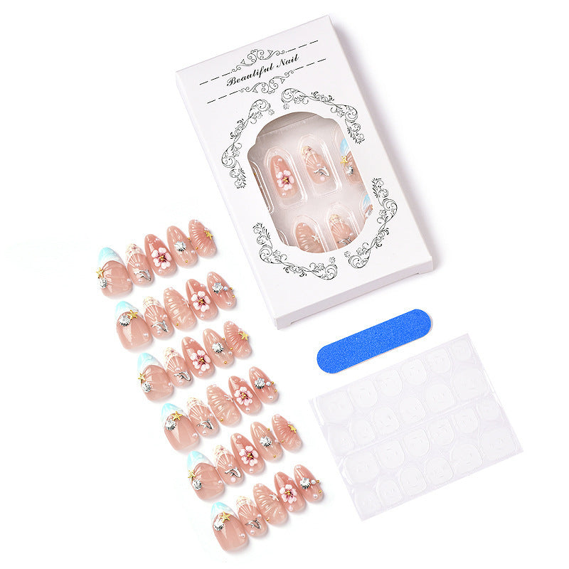 Acrylic nail set with filigree shell and flower decorations Kalsten
