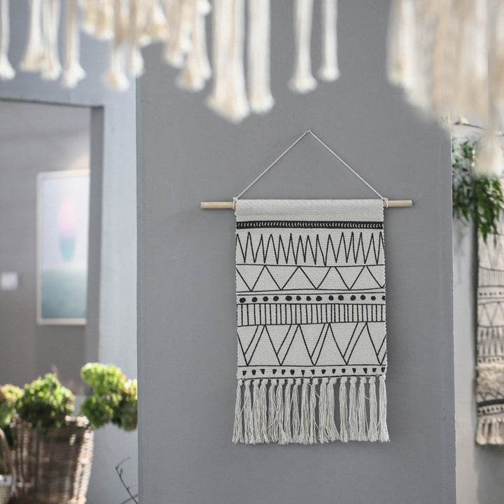 Woven Boho wall hanging with fringes and graphic ethnic pattern Kalsten