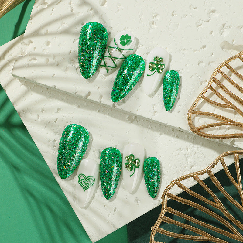 Artistic Stiletto Nails with Glitter and Clover Leaf Designs Kalsten