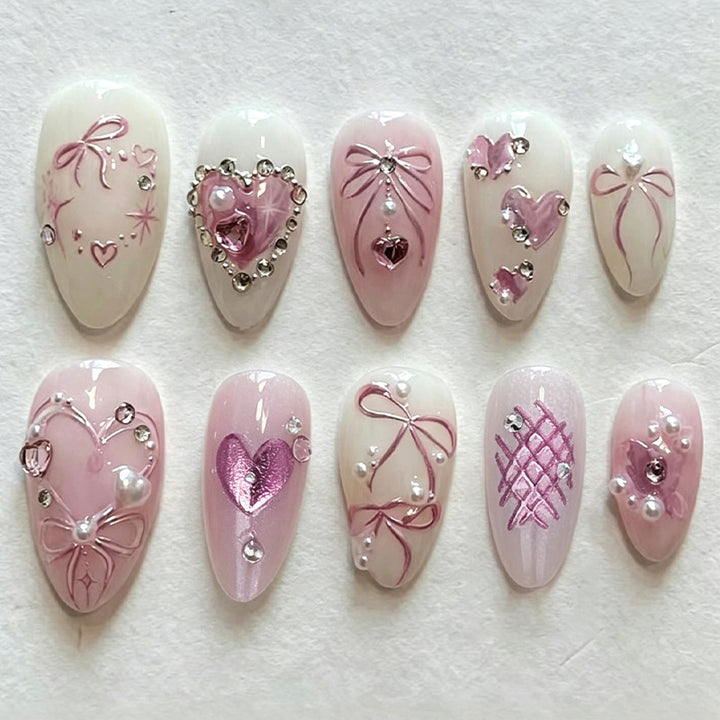 Artificial nail set with romantic bow and heart designs Kalsten