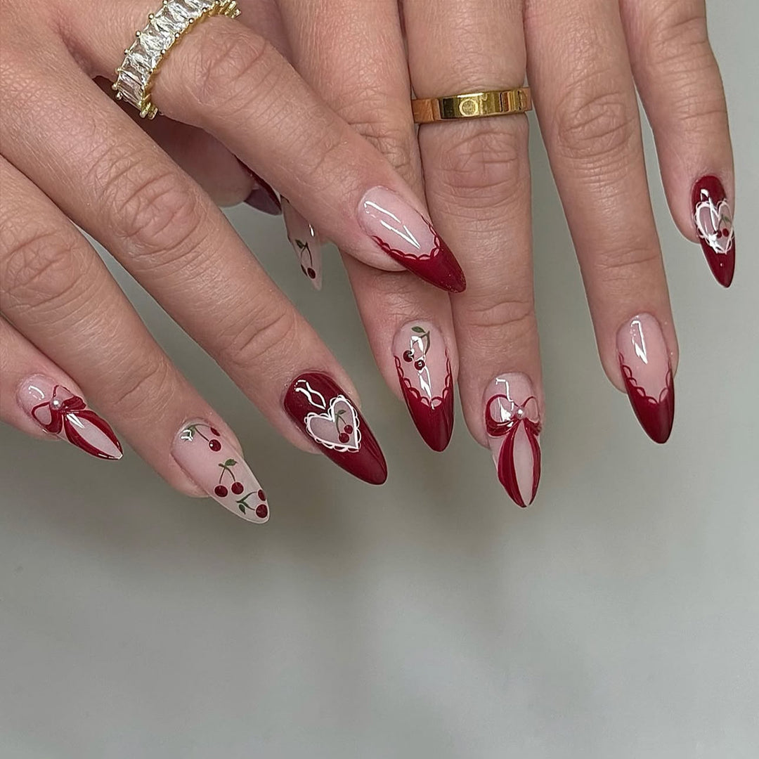 Creative nail set with romantic heart and bow accents Kalsten