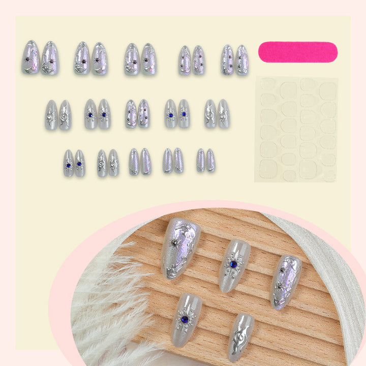 Acrylic nail set with holographic accents and elegant embellishments Kalsten