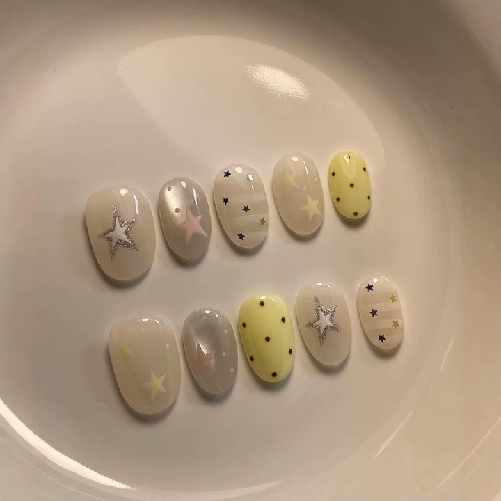 Artistic Press-On Nail Set with Whimsical Patterns