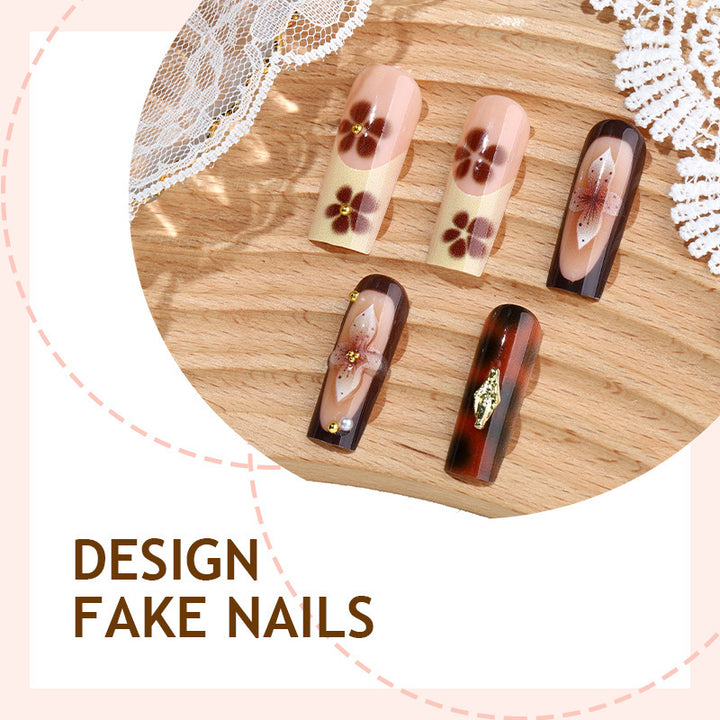 Nail set with floral accents and glitter accents Kalsten