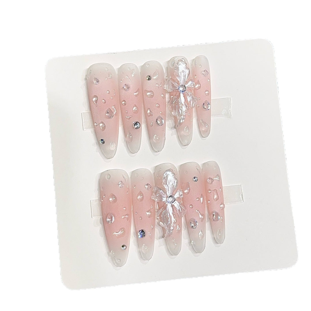 Glamorous artificial nails with sparkling accents Kalsten