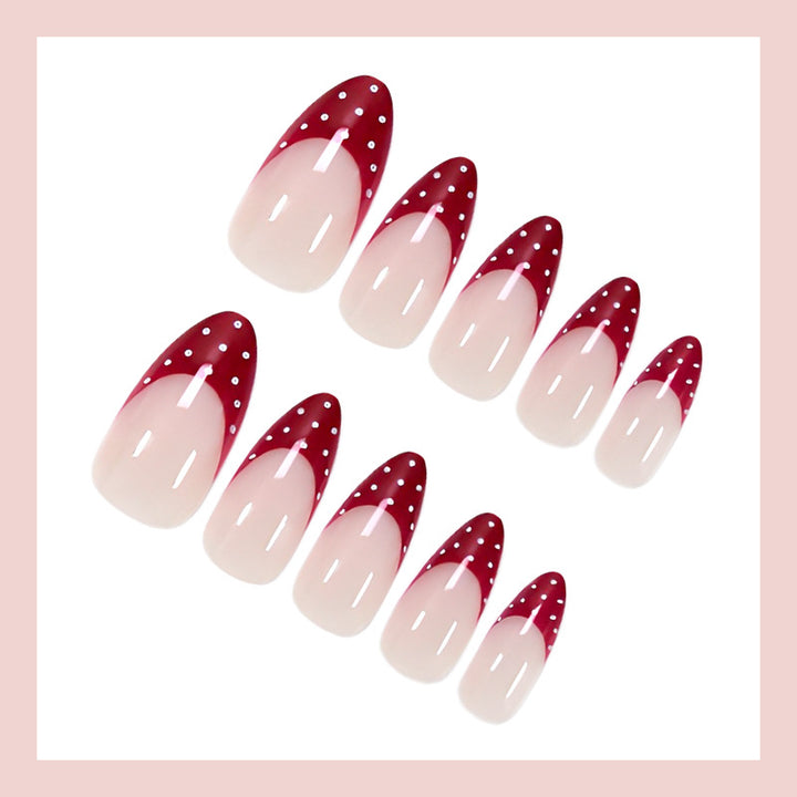 Nail art set with elegant red tips and playful dots Kalsten