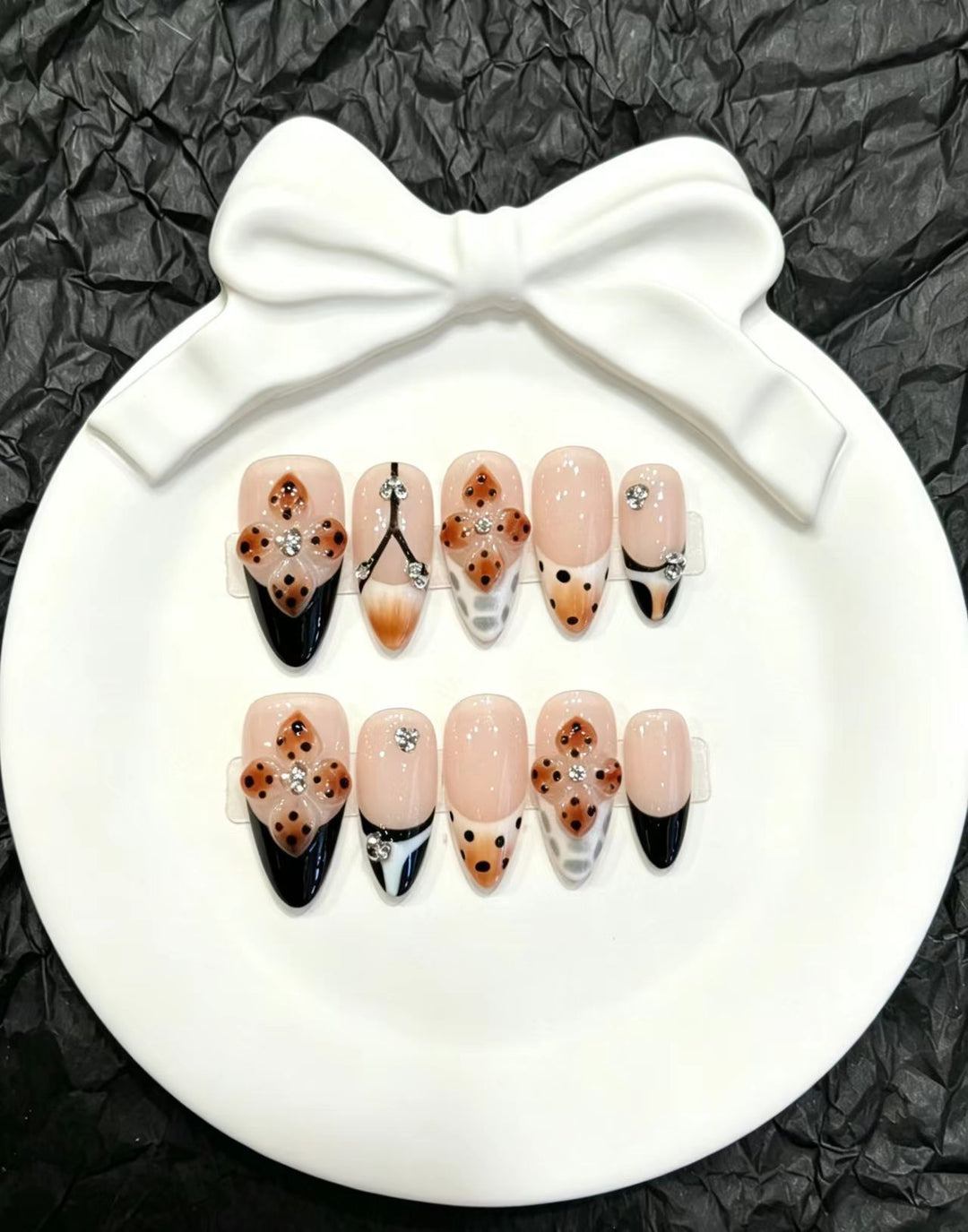Artistic Press-On Nail Set with Floral and Gem Accents