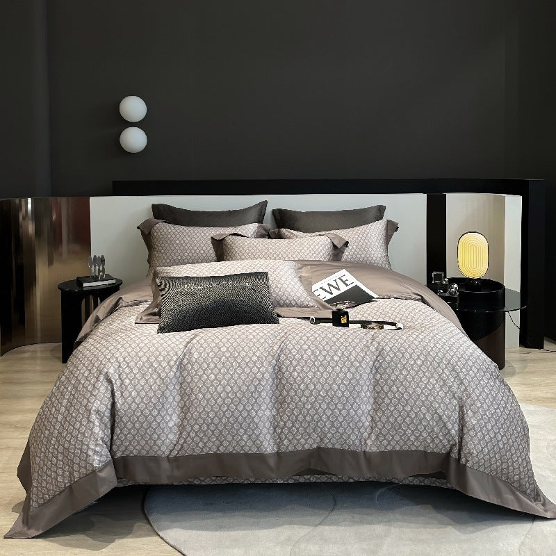Elegant bed linen set made of cotton satin with discreet jacquard pattern and reversible function