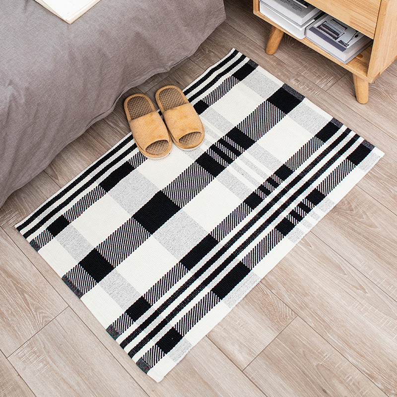 Woven cotton blend bath mat in buffalo check with flat weave structure Kalsten