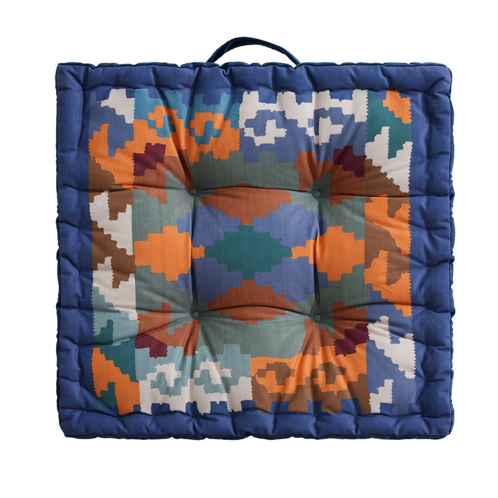Padded seat and floor cushion with carrying handle and graphic ethno pattern Kalsten