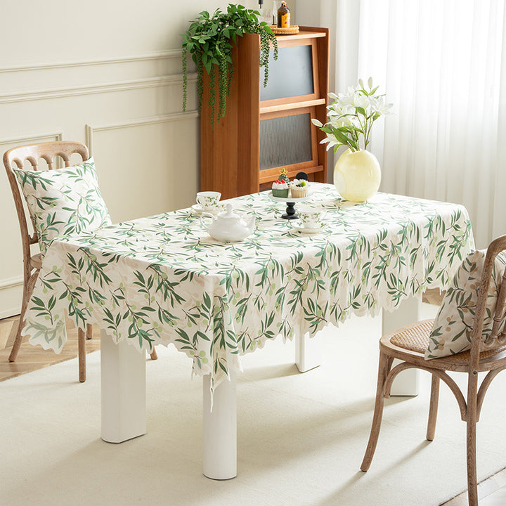 Round wipeable tablecloth with floral cut-out hem Kalsten