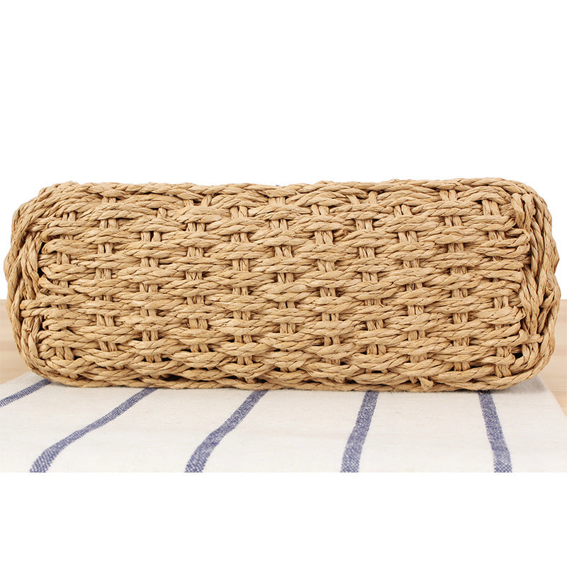 Handbag made of hand-woven natural material with pearl decoration Kalsten