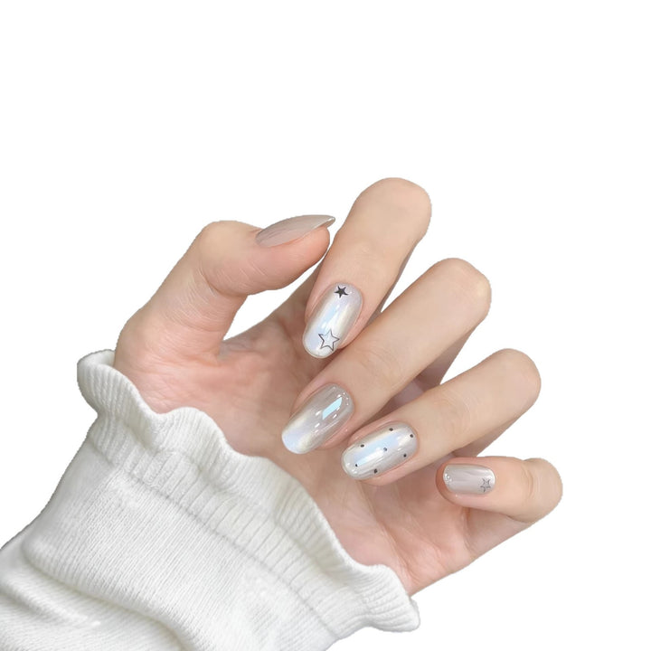 Artistic Press-On Nail Set featuring Celestial and Abstract Patterns