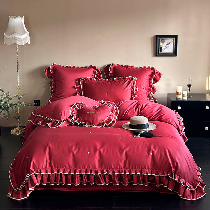 Cotton satin bed set with double-layer ruffled trim, contrast edge and heart embroidery
