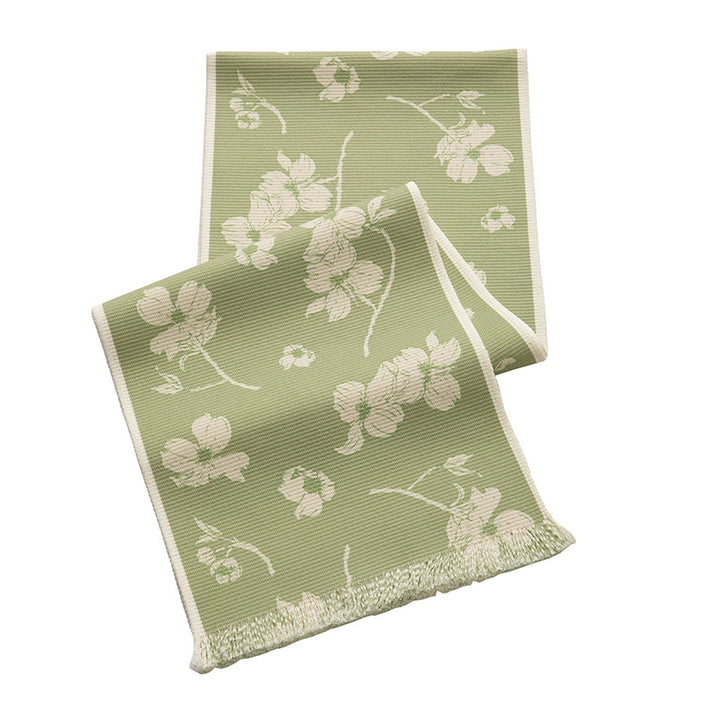 Woven table runner with floral jacquard pattern and fringed edge Kalsten