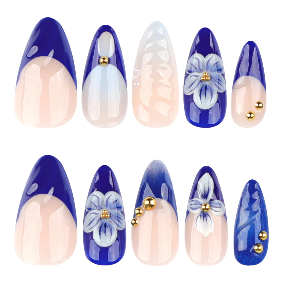Artistic nail art with floral accents and glitter embellishments Kalsten
