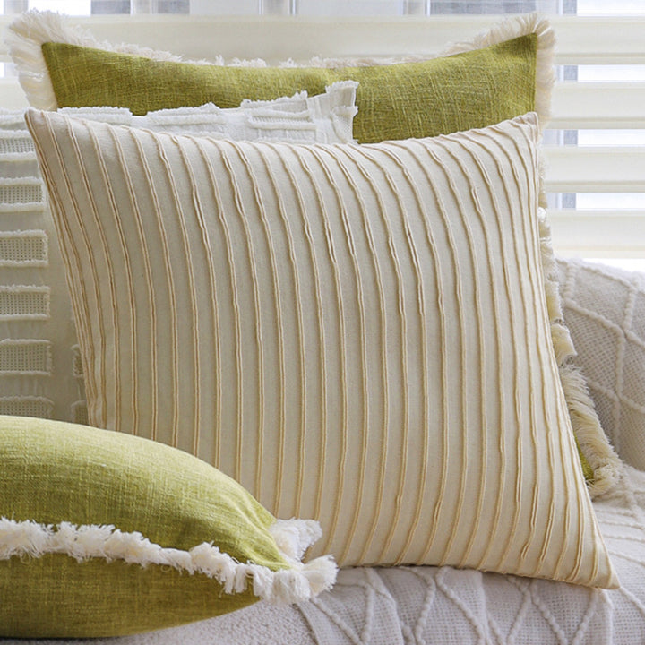 Square decorative pillow cover made of cotton blend with relief rectangular tufts and fringed edge Kalsten