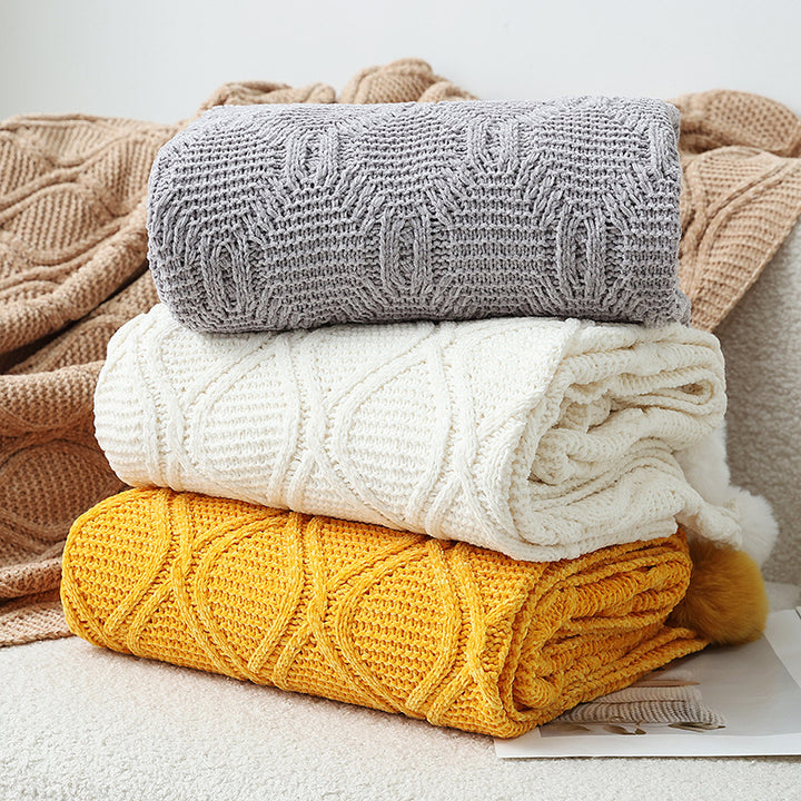 Ladies knit blanket with decorative pom poms Kalsten