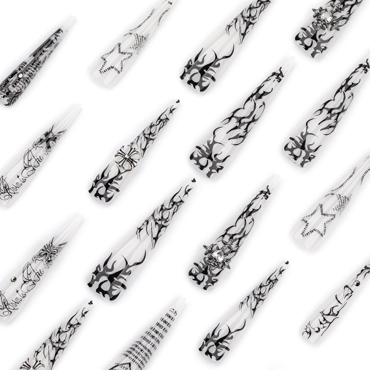 Artful stiletto nails with gothic pattern and embellishments Kalsten