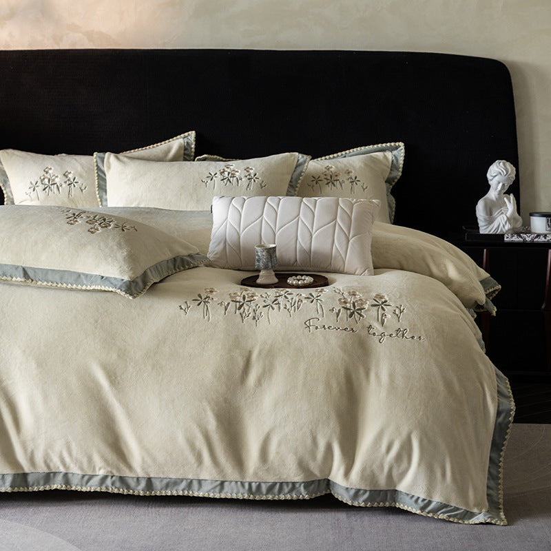 Premium cotton satin bed linen set with floral relief embroidery and satin trim