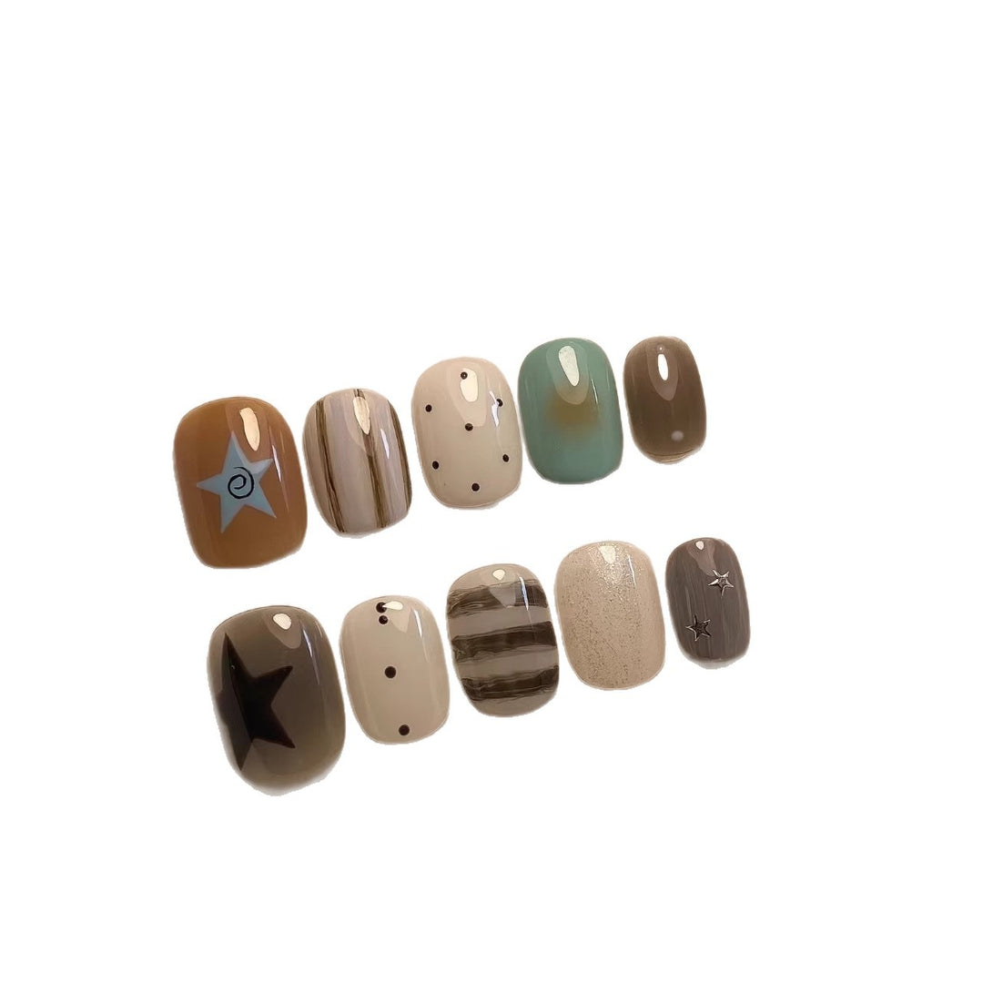 Artistic Press-On Nail Set with Geometric and Star Designs
