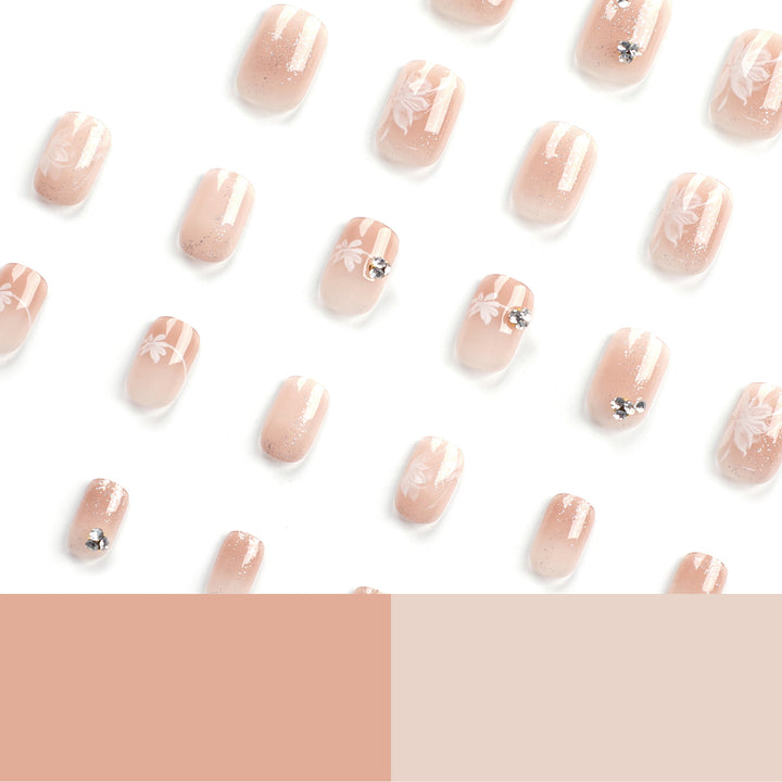 Elegant Nail Art with Holographic Accents and Floral Embellishments Kalsten