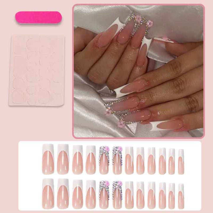 Art nail set with elegant glitter and floral accents Kalsten