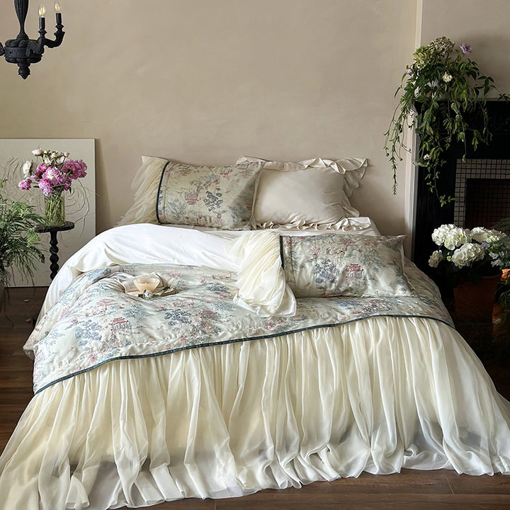 Satin bedding set with ruffled bed skirt and vintage toile print
