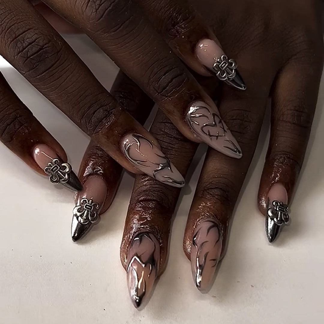 Artful stiletto nails with elegant accents Kalsten