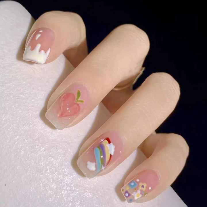 Creative nail art with fruit and flower motifs Kalsten
