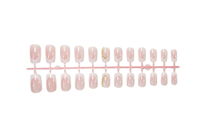 Artificial nail set with elegant French tips and glitter accents Kalsten