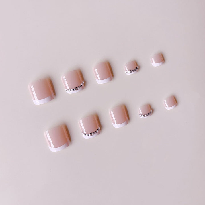 Nail art set with elegant French design and sparkling accents Kalsten
