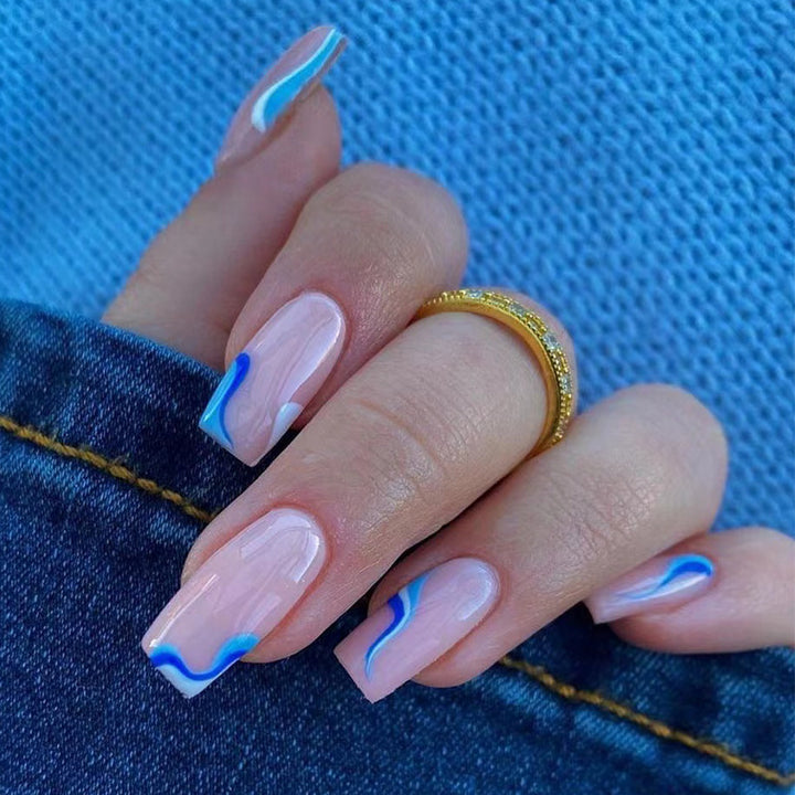 Artful nail extensions with maritime wave pattern Kalsten